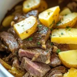 Slow Cooker Steak and Cheddar Potato Casserole